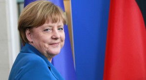 Angela Merkel "z szacunkiem przyjęła do wiadomości" decyzję May